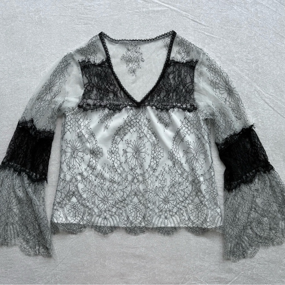 Nanette Lepore white and black lace top with bell sleeves